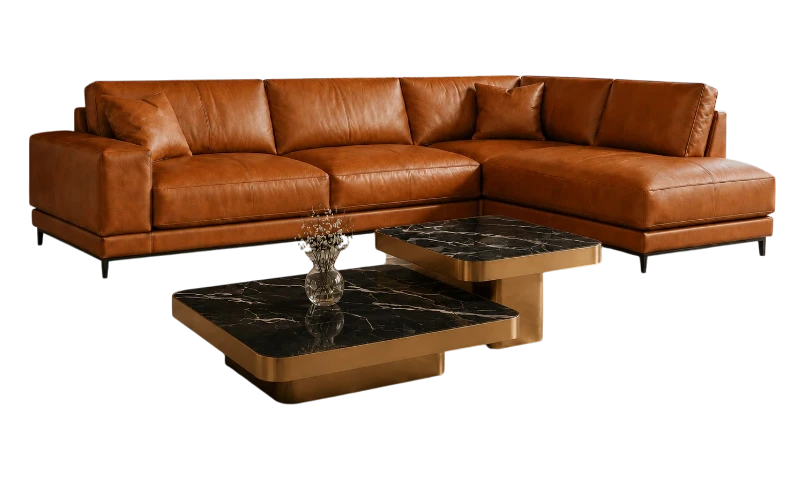 Sofa da bò Ý nổi bật với form dáng hiện đại, đệm ngồi rộng rãi và cảm giác êm ái. Khi kết hợp cùng bàn trà mặt đá đen tia chớp, không gian phòng khách trở nên sang trọng, ấm cúng và có điểm nhấn cao cấp.