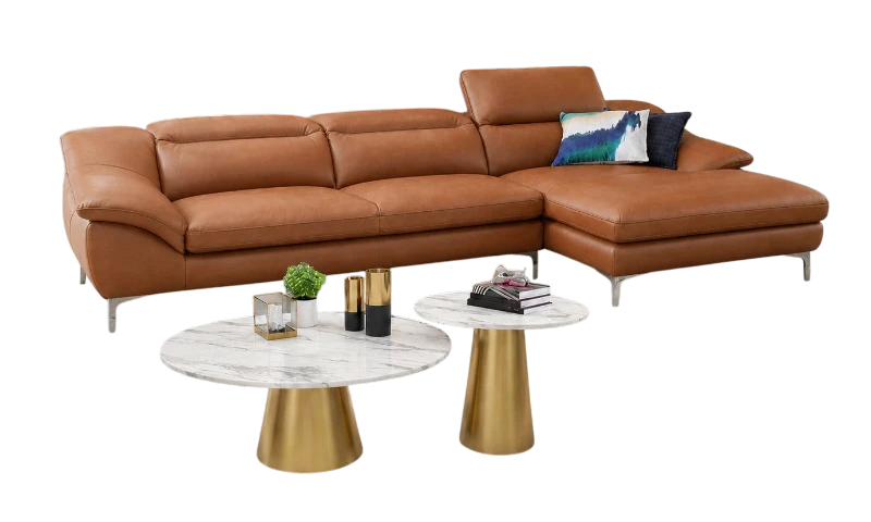 Bộ sofa da tựa đầu bật màu nâu bò hiện đại kết hợp bàn sofa mặt đá chân inox mạ vàng, mang đến vẻ đẹp sang trọng và tinh tế cho không gian phòng khách. Thiết kế sofa chữ L rộng rãi với phần ghế thư giãn êm ái, đường may sắc nét và chất liệu da cao cấp giúp tạo cảm giác thoải mái khi sử dụng. Sản phẩm phù hợp cho căn hộ hiện đại, biệt thự, nhà phố hoặc không gian nội thất cao cấp.